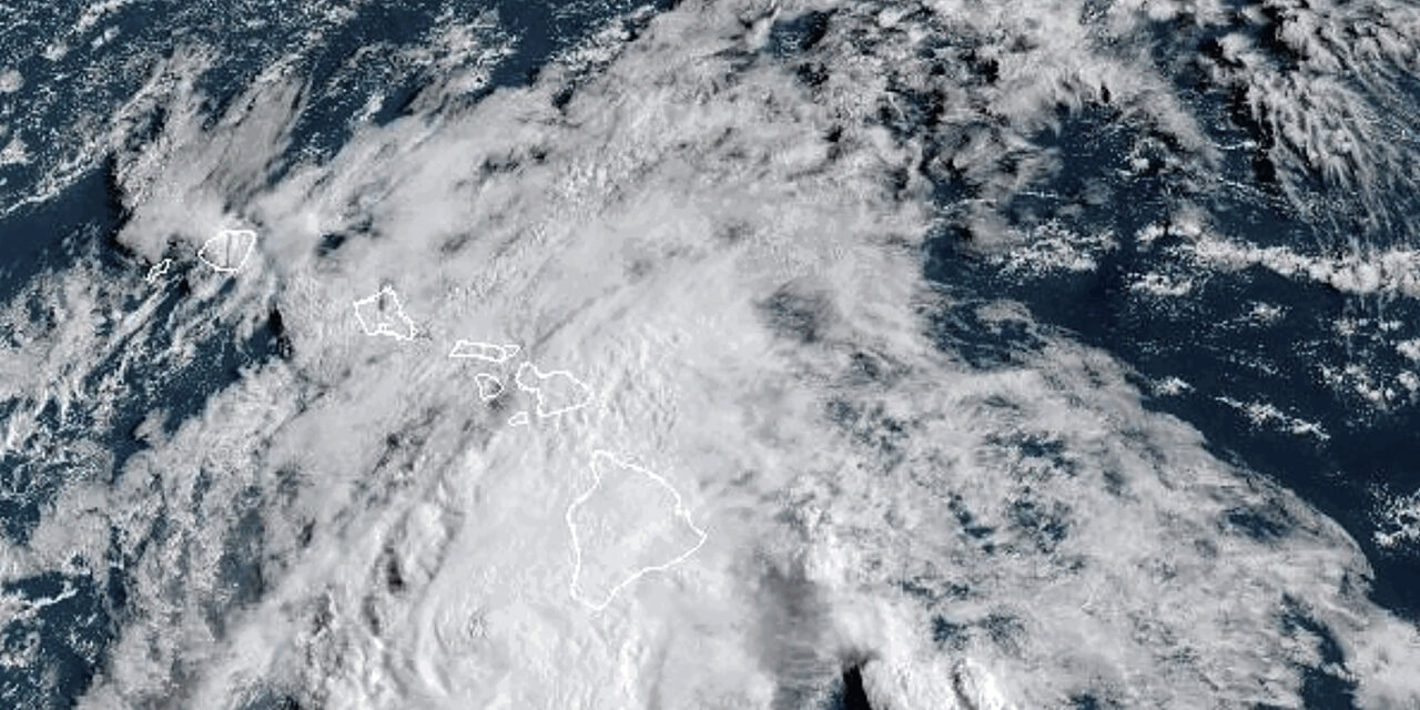 Hone swirls past Hawaii’s main islands after dumping enough rain to ease wildfire fears