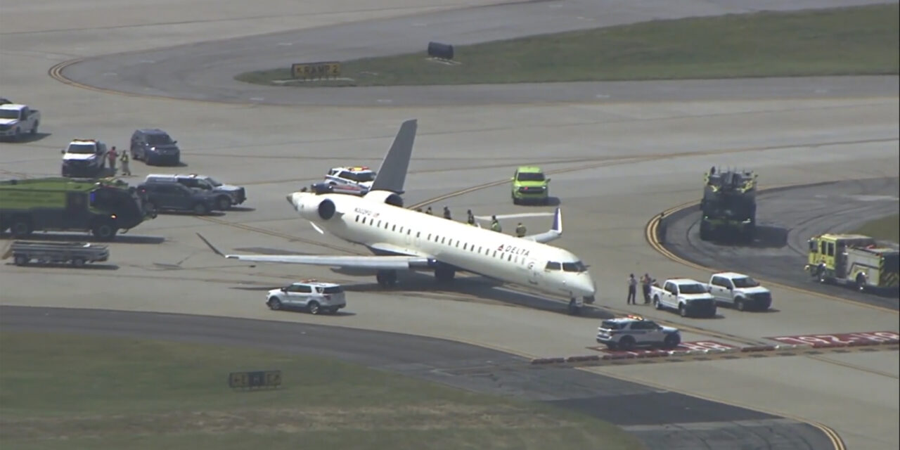 Two Delta planes collide on an Atlanta taxiway, knocking the tail off one