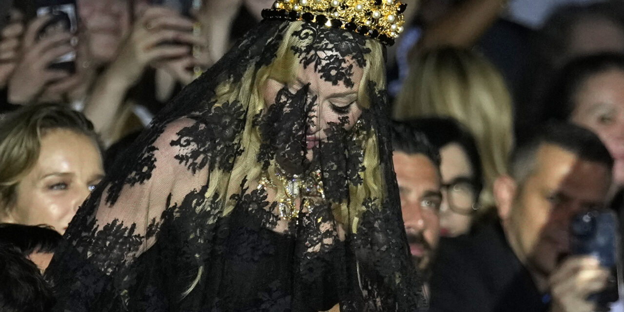 Madonna makes veiled entrance to Dolce&Gabbana for show celebrating her 1990s heyday