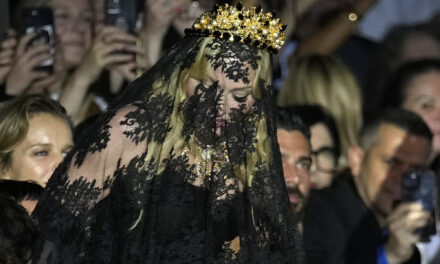 Madonna makes veiled entrance to Dolce&Gabbana for show celebrating her 1990s heyday