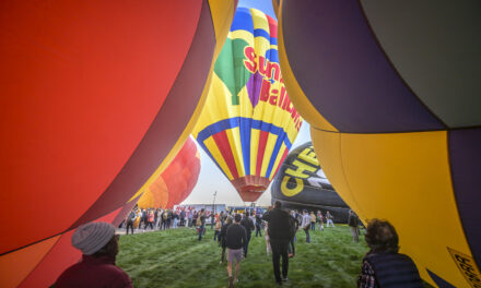 ‘Magical’ flotilla of hot air balloons take flight at international fiesta amid warm temperatures