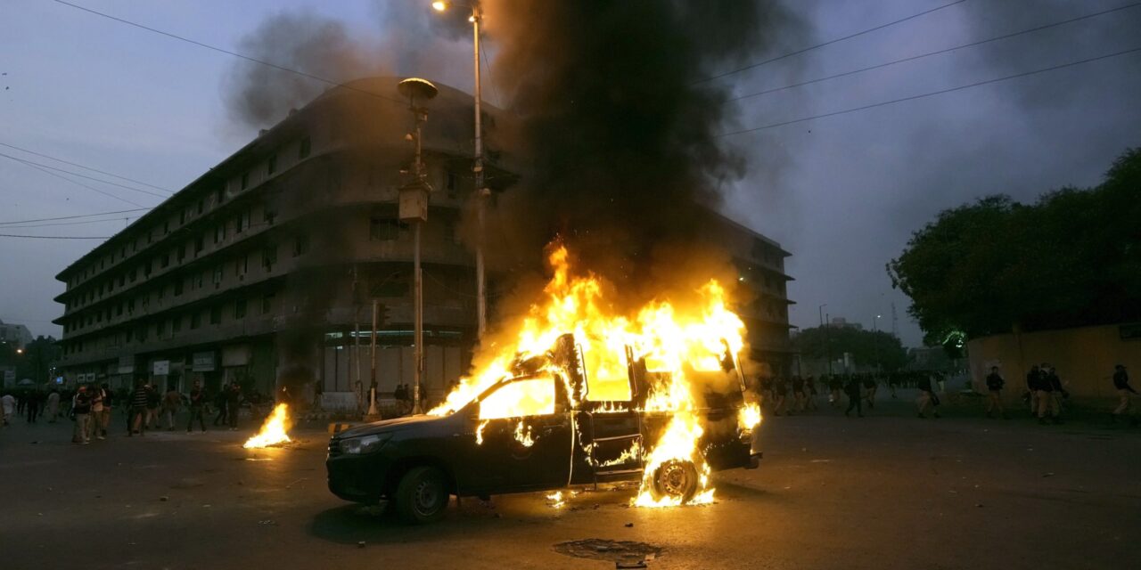 Pakistani police fire tear gas and charge protesters in Karachi