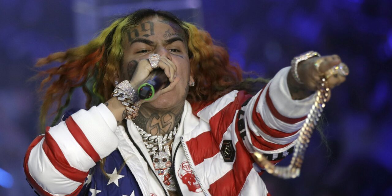 Rapper Tekashi 6ix9ine is arrested in New York for a possible parole violation