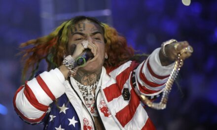 Rapper Tekashi 6ix9ine is arrested in New York for a possible parole violation