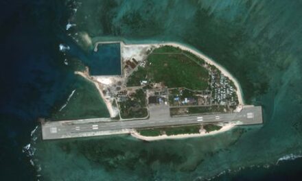 Exclusive-Chinese ships gather near island disputed with Philippines, satellite images show