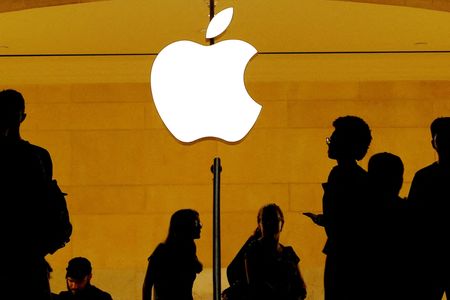 Apple accused of silencing workers, spying on personal devices