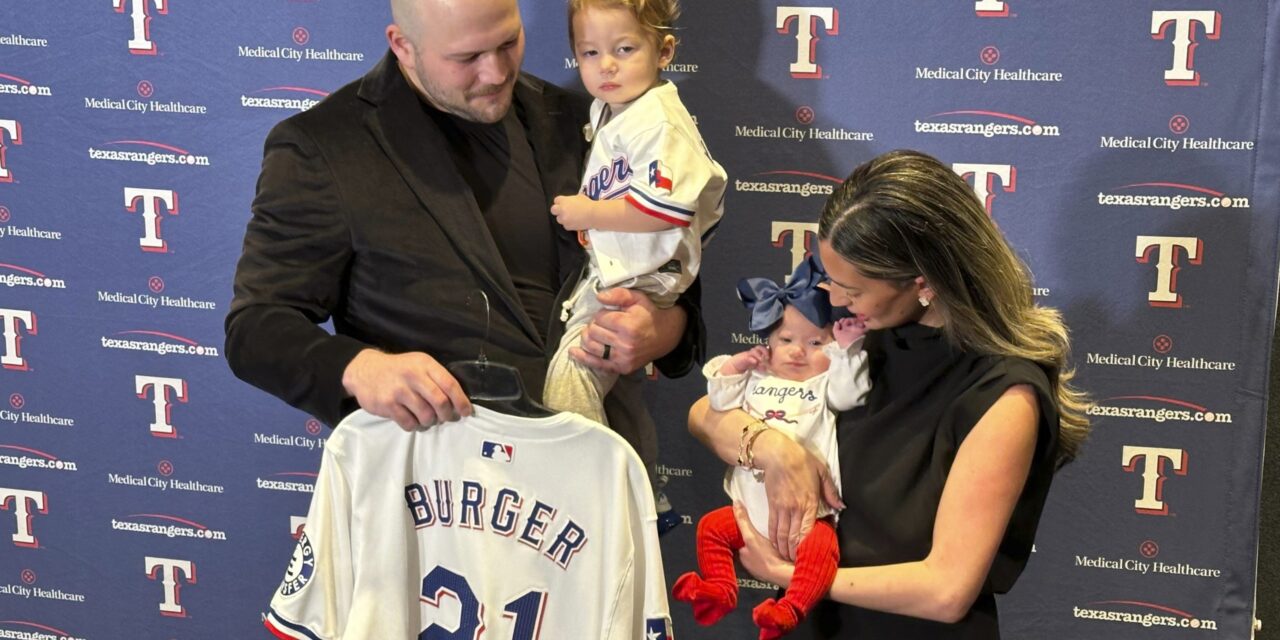 Jake Burger will wear No. 21 with the Texas Rangers for his daughter born with Down syndrome