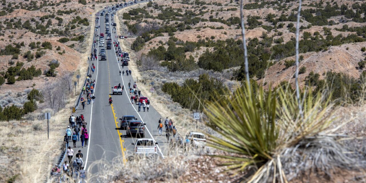 Thousands of pilgrims trek through New Mexico desert to historic adobe church for Good Friday