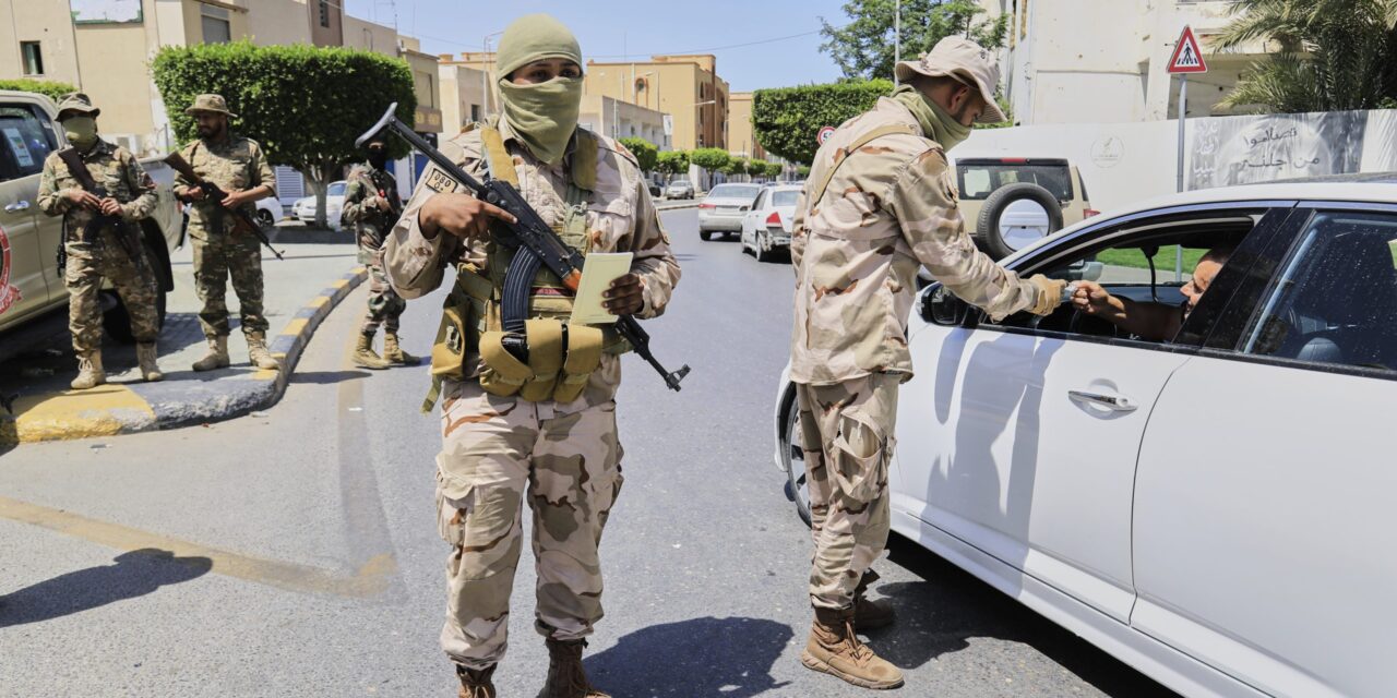A warlord and 6 other people killed as militia infighting rocks Libya’s capital, officials say