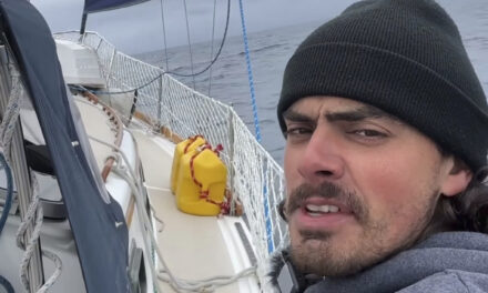 An Oregon man who quit his job to set sail with his cat arrives to cheering fans in Hawaii