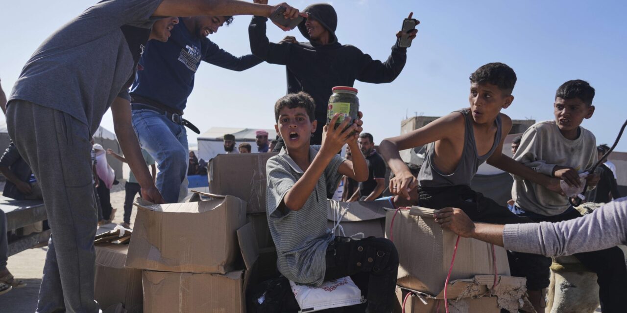AP PHOTOS: Starving civilians caught in the chaos of food distribution in Gaza