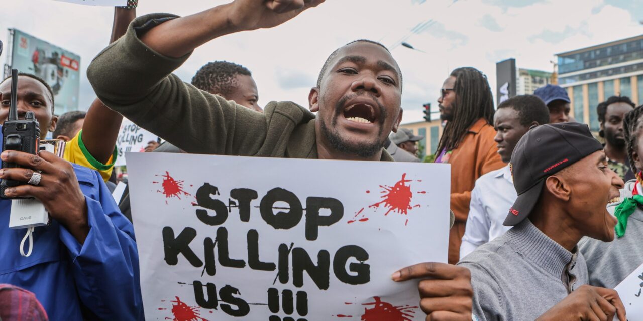 Police tear gas activists protesting the death in police custody of a Kenyan blogger