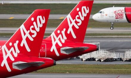 AirAsia is in talks to convert some existing Airbus orders into long-range jet orders, sources say