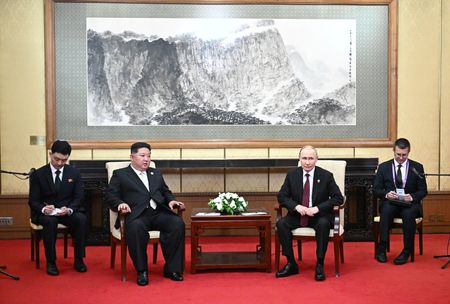 Putin invites North Korea’s Kim to Russia after holding talks in Beijing with him